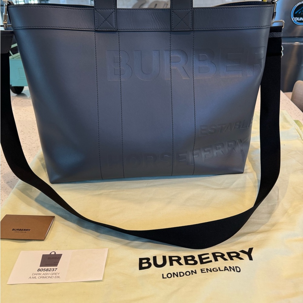 Brand new XL gray leather Burberry Tote. Retail $1,780.